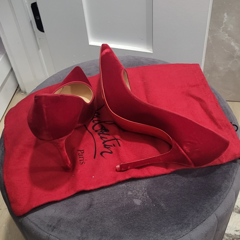 Red Christian Louboutin pumps